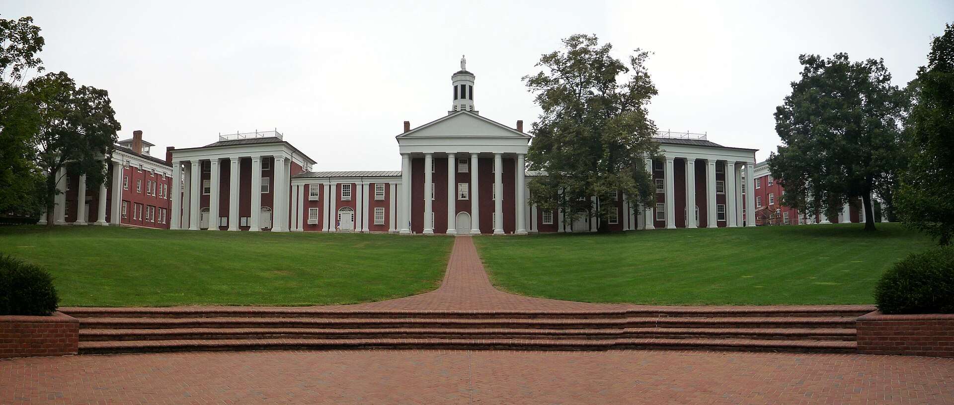 Various buildings are featured beyond a lawn at Washington and Lee University.