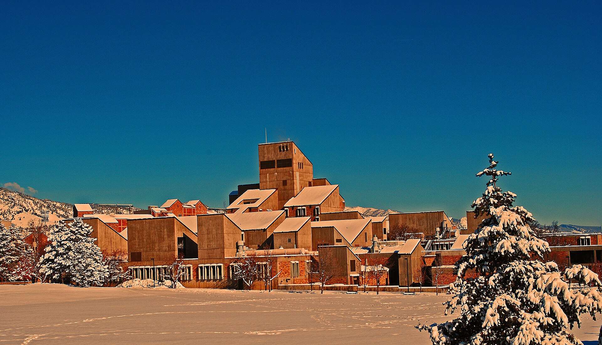 This is the engineering center at CU Boulder under snowfall.